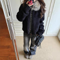 Black fuzzy coat with large fur collar and shearling jacket